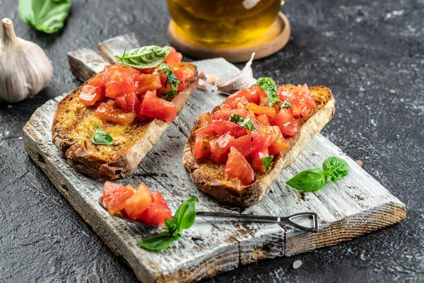 Spanish breakfast with toast of bread with oil and tomato. banner, menu, recipe place for text, top view.