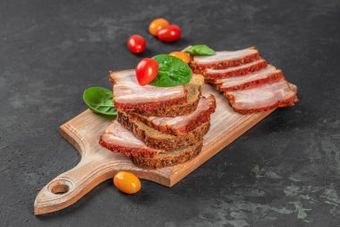 sandwich with pork ham on a wooden board, top view. copy space, clipart