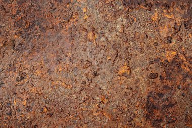 Paslanmış paslı metal yüzey, kabataslak desenli arka plan.