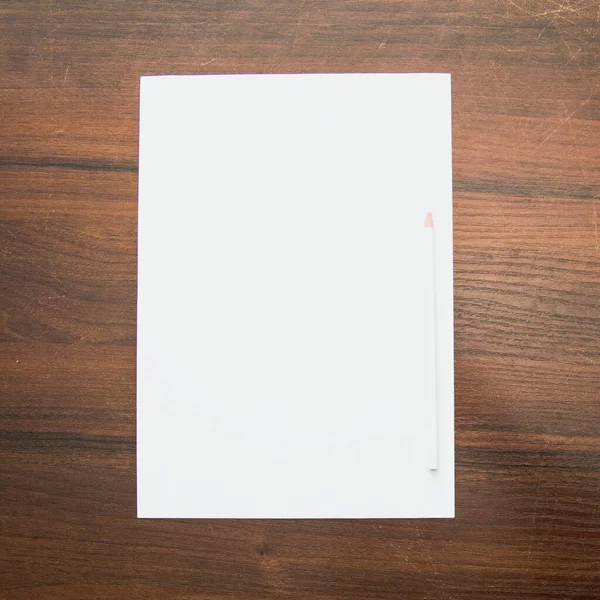 Blank White Paper Sheet Black Desk Top View Mock — Stock Photo, Image