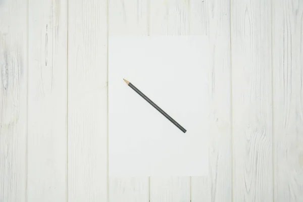 Λευκό Κενό Σημειωματάριο Στυλό Ξύλινο Φόντο — Φωτογραφία Αρχείου