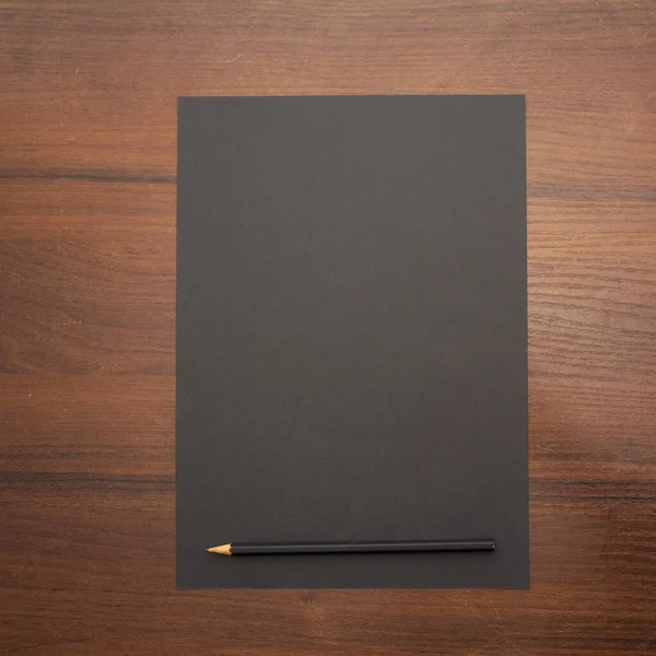 Üzleti Irodai Koncepció Fekete Ceruza Egy Fehér Üres Jegyzettömb Könyvvel — Stock Fotó