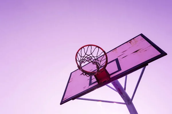 old abandoned street basket hoop