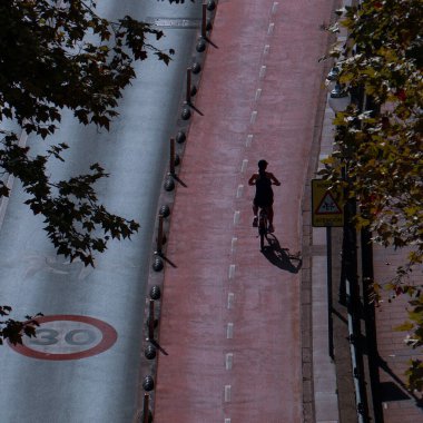 cyclist on the street, bicycle mode of transportation in Bilbao city, spain 
