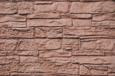 Caddedeki eski kahverengi duvarın soyut arkaplanı 