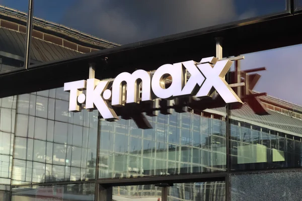 stock image Berlin, Germany - 03. October 2022: Entrance of a branch of the company T.K. Max with a glass facade