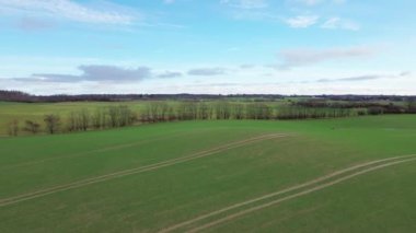 Aerial video of a drone flying over agricultural land in northern Germany.