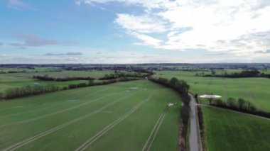 Aerial video of a drone flying over agricultural land in northern Germany.