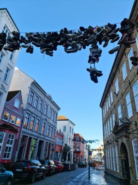 Flensburg, Germany - 18 February 2023: Old architecture in the streets of Flensburg on a sunny day