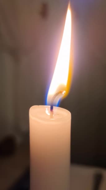Candle Flame Moves Slowly Wind Vertical Shot — Stock Video
