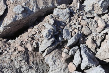 Yüksek çözünürlüklü çakıl zemindeki kum ve taşlar.