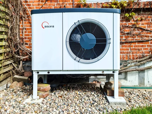 Stock image Kiel, Germany - 13. July 2023: A Solvis brand heat pump in front of a residential building