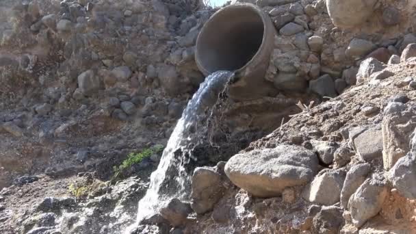 Waste Water Flows Out Sewage Pipe Sandy Hole — Stock Video