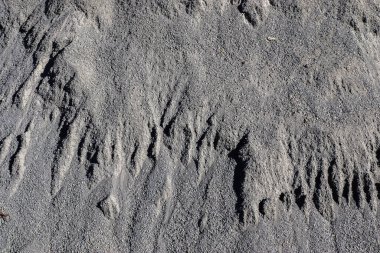 Yüksek çözünürlükte kahverengi kum zemin dokusunda ayrıntılı yakın görünüm