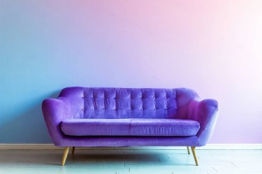 Pastel renkli duvarın önünde yeni bir kanepe ve fotokopi alanı.