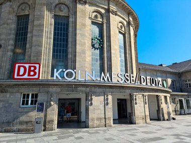 Cologne, Germany - 24 July 2024: The old station building of the Cologne Messe Deutz station in summer weather clipart