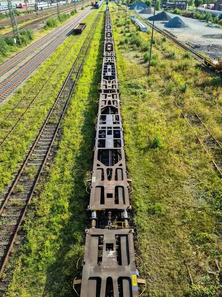 stock image View of the tracks of a freight station with some wagons and numerous sidings