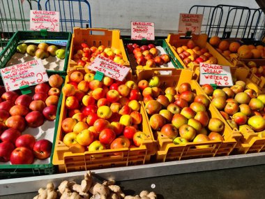 Preetz, Germany 21. September 2024: A market with fruit and vegetable stalls on a market square in the city center clipart