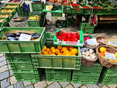 Preetz, Germany 21. September 2024: A market with fruit and vegetable stalls on a market square in the city center clipart