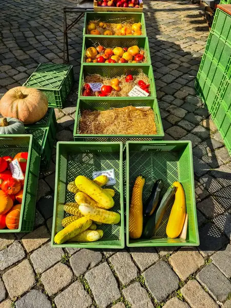 stock image Preetz, Germany 21. September 2024: A market with fruit and vegetable stalls on a market square in the city center