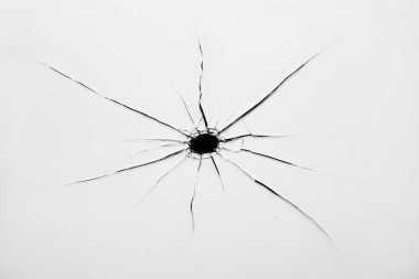 A broken glass window pane on a white background clipart