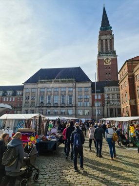 Kiel, Germany - 28. September 2024: Many stalls offering their fabrics for sale in the city center of Kiel clipart