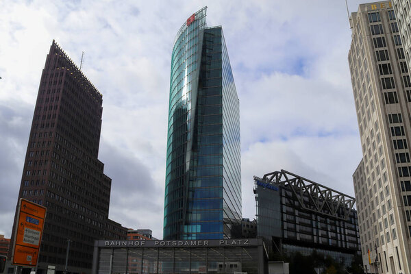 Berlin, Germany 03. October 2024, Modern skyscrapers rising above Potsdamer Platz train station in Berlin, Germany, featuring iconic architecture and urban development
