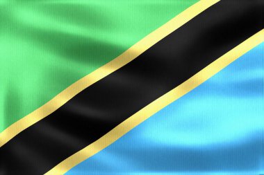 Çerçeveyi dolduran Tanzanya bayrağını sallamak, yeşil, mavi, siyah ve sarı renkli canlı renkler sergilemek, ulusal gurur ve birliği simgeliyor.