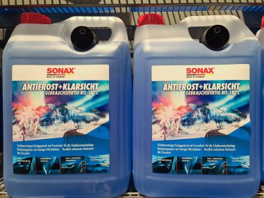 Sonax antifreeze windshield washer fluid jugs displayed for winter automotive car care