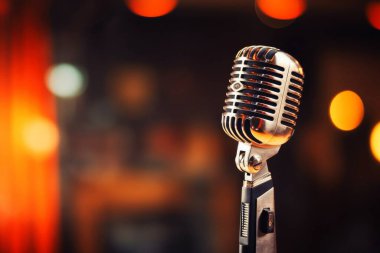 Close up of a vintage microphone on a stage