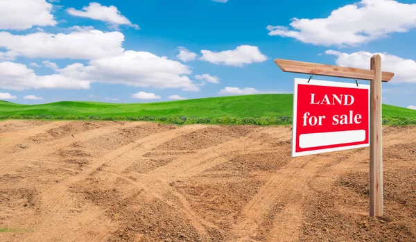 House symbol and land for sale signboard and empty dry cracked swamp reclamation soil, land plot for housing construction project with and beautiful blue sky with fresh air Land. 