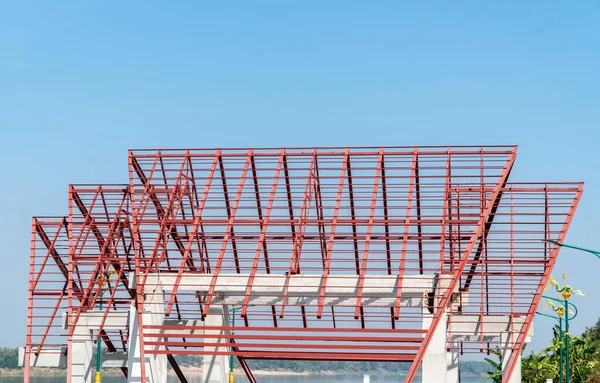 steel frames and trusses of a industrial building. steel frame building project scheme.