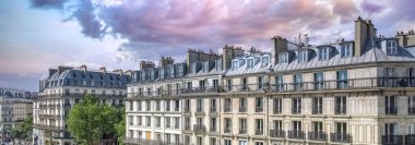 Paris, buildings in the Marais, in the center, in a typical street clipart