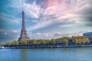 Paris, the Bir-Hakeim bridge on the Seine, with the Eiffel Tower in autumn clipart