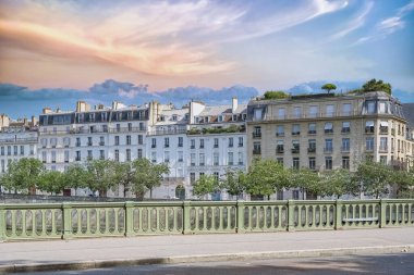 Paris, ile saint-louis and quai de Bethune, beautiful ancient buildings clipart