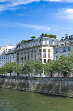 Paris, ile saint-louis and quai de Bethune, beautiful ancient buildings clipart