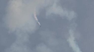 Italy, Jesolo - August 2022. Plane of the Tricolor Arrows falls from the sky with a trail of smoke behind