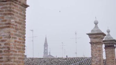Roofs with towers of an ancient city of Emilia-Romagna in the province of Ferrara.