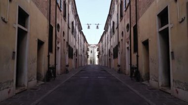 Movement on the street with old buildings