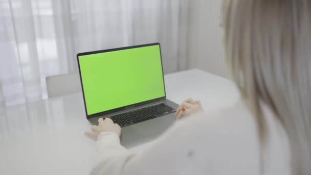 Woman Seated White Table Using Laptop Computer Chroma Key — Stock Video