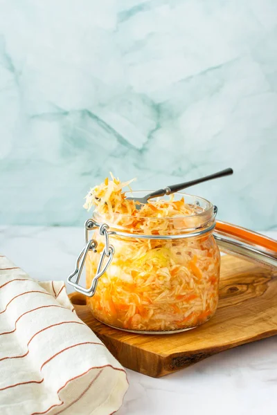Fresh fermented vegetables, fermented cabbage with carrots, healthy natural probiotics, healthy nutrition, sauerkraut
