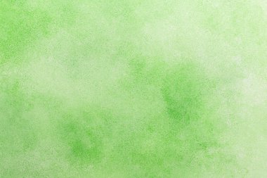 Yaratıcı tasarım, üst görünüm ve kopyalama alanı için yumuşak tonlar ve temiz bir yüzey sunan minimalist yumuşak yeşil doku arka planı