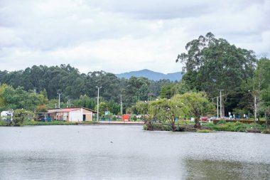 January 22, 2023, Sopo, Colombia: Lake of the Sopo Bridge Park, a place of rest and connection with nature in Cundinamarca. clipart