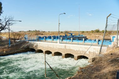 Carrizal Dam, Mendoza, Argentina; Aug 17, 2023: Generation of hydroelectric energy from water power. clipart