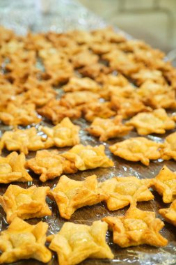 Pastelitos, geleneksel Arjantin gevreği, özellikle ulusal bayramlarda yenir, taze kızartılmış ve yemeye hazır..