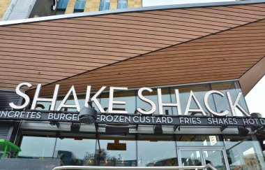 Las Vegas, USA - March 20, 2018 : Shake Shack american restaurant logo name on the Las Vegas Boulevard, famous The Strip street in Las Vegas. Shake Shack fast food entrance.
