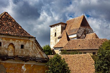 The Village of Roades with the fortified Church clipart