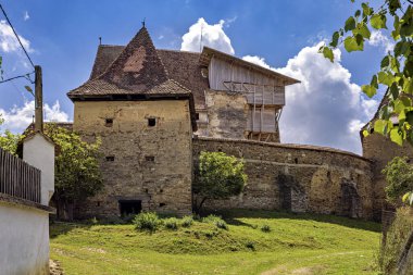 The Village of Roades with the fortified Church clipart