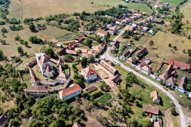 The Village of Roades with the fortified Church clipart