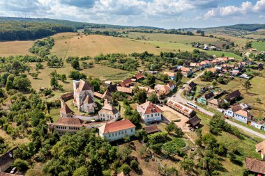 The Village of Roades with the fortified Church clipart